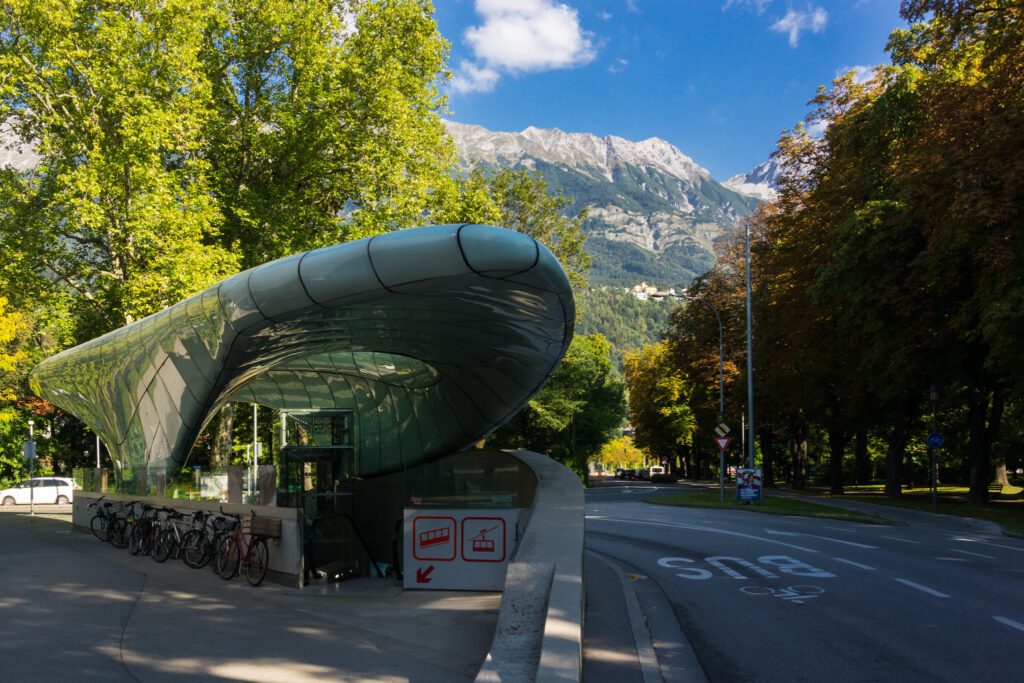 Innsbruck in Summer: modern Hungerburgbahn funicular station with mountain view