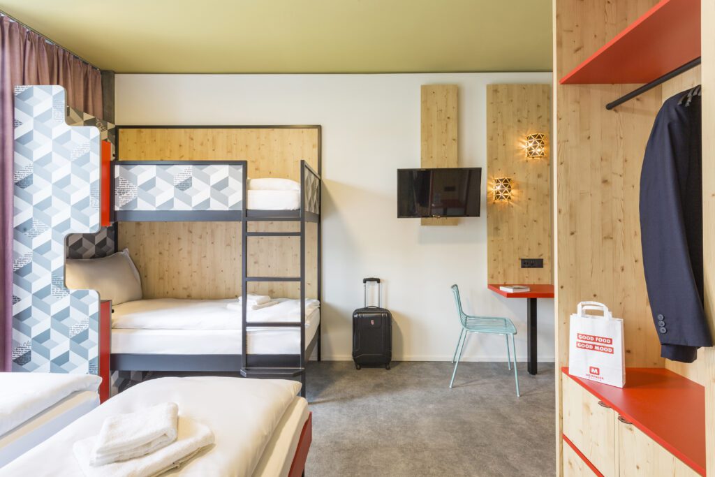 Quadruple room at MEININGER Hotel Zurich Greencity with cozy bunk beds